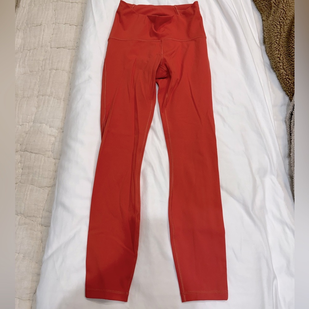 Lululemon size 4 tights- orange
